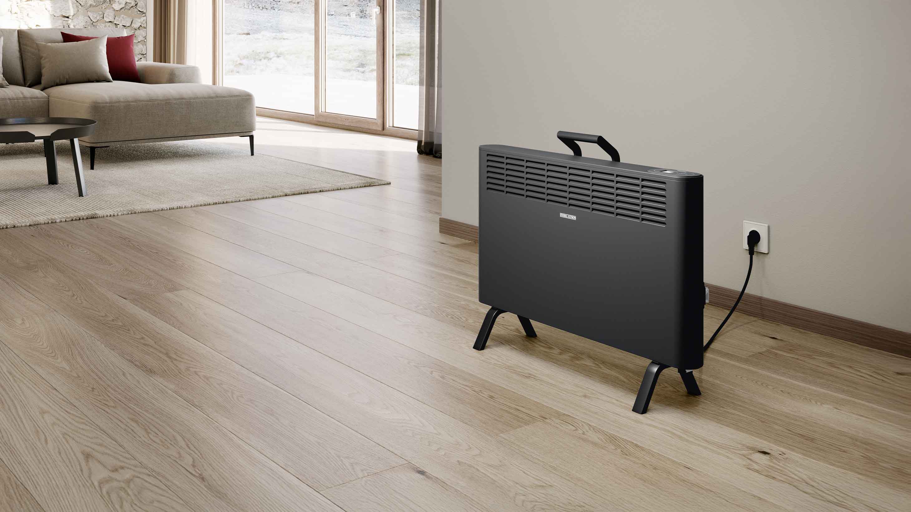 Tragbare Elektroheizung von STIEBEL ELTRON in einem Wohnzimmer