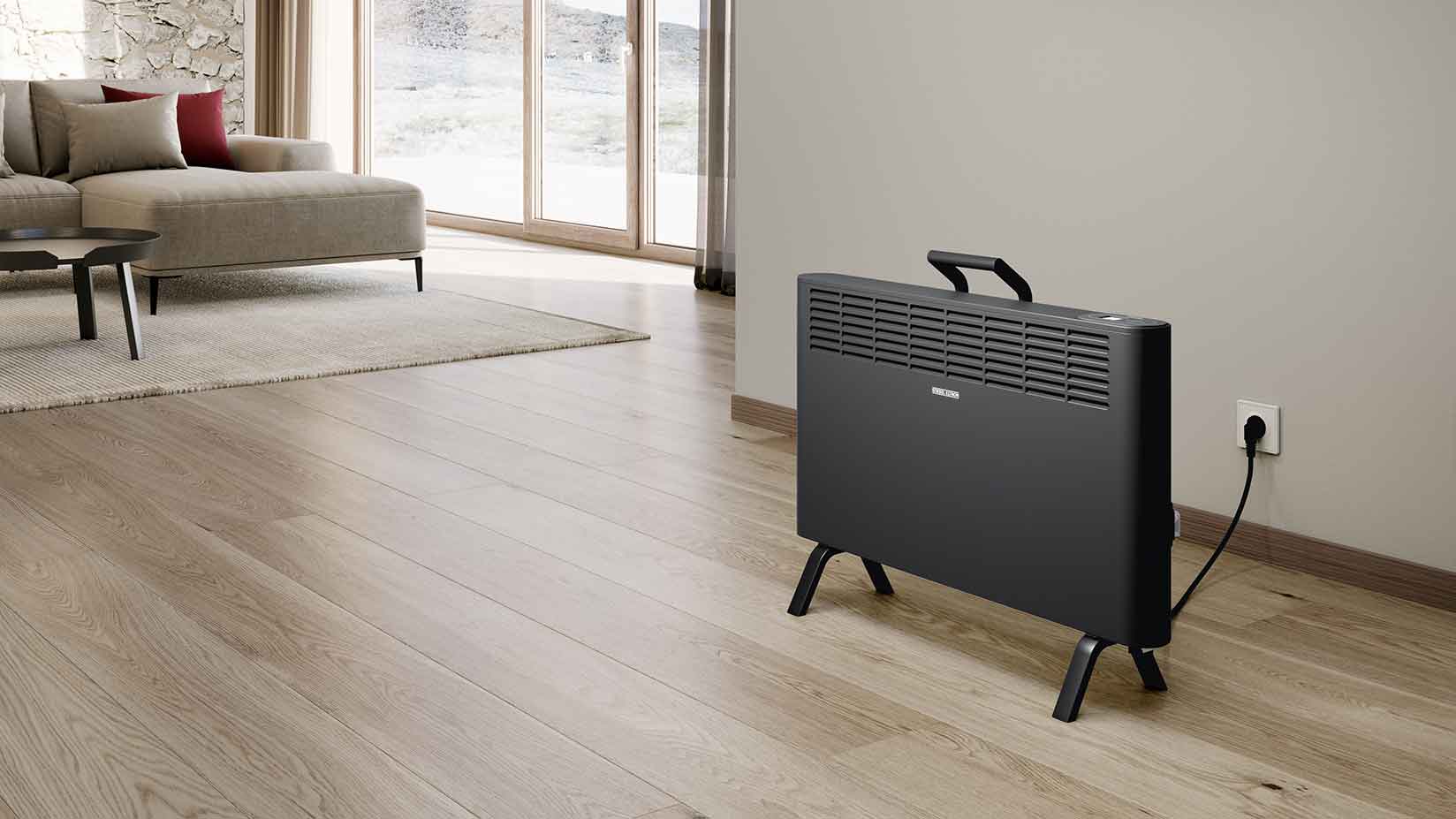 Schwarze Elektroheizung in einem Wohnzimmer