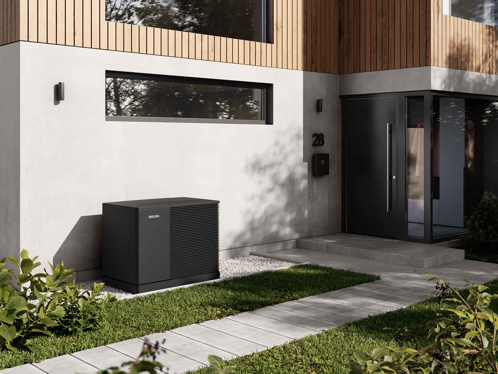 Schwarze Wärmepumpe von STIEBEL ELTRON vor einem modernen Haus