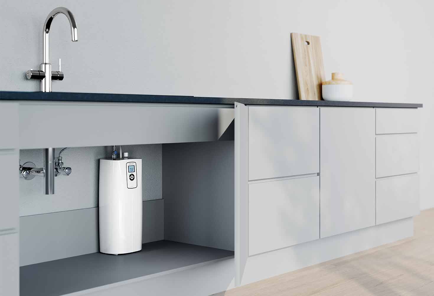 Der platzsparende Heißwasserautomat HOT 2.6 N Premium mit der 3in1-Küchenarmatur