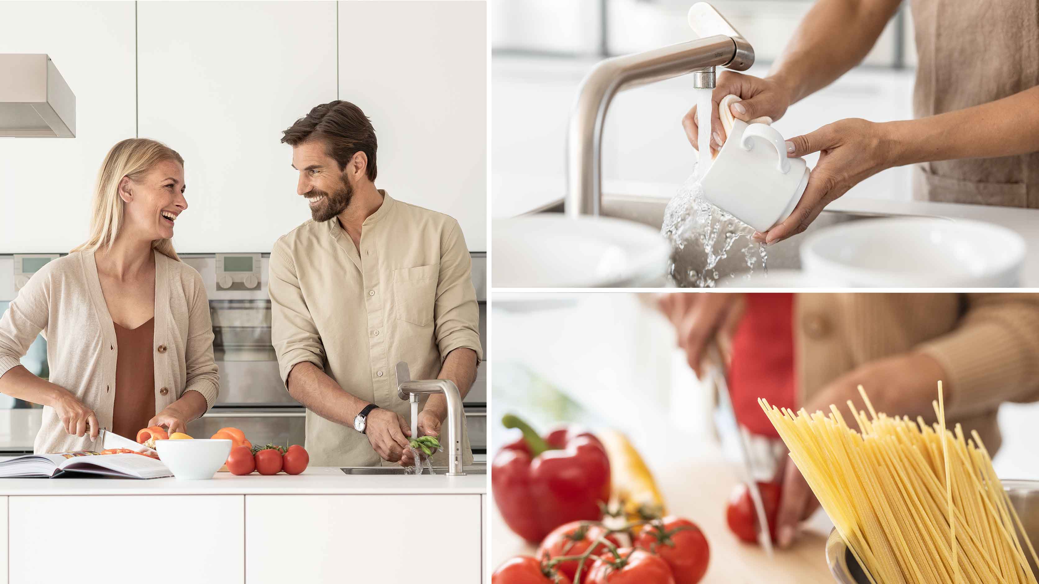 Ein Paar gemeinsam in der Küche. Mit dem warmen Wasser aus dem Untertischgerät werden Tomaten unter dem Wasserhahn abgespült. Ein Topf mit Spagetti und Tomaten die geschnitten werden.